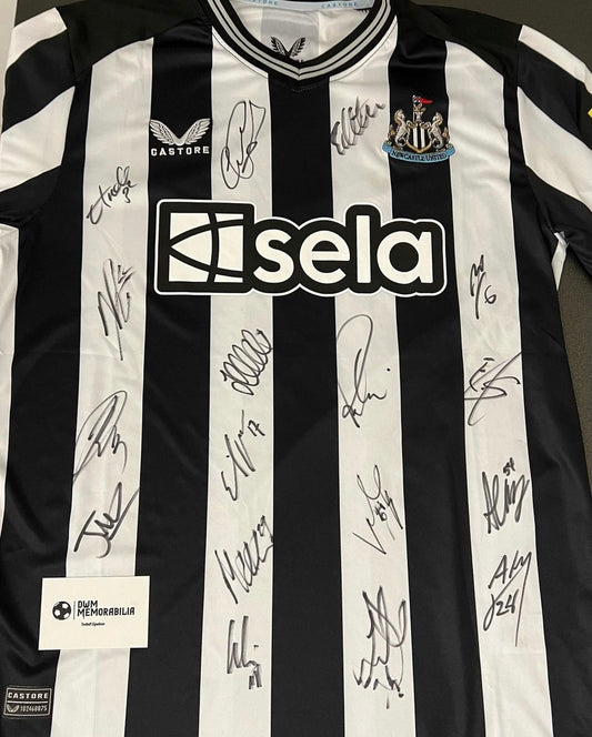 Newcastle United squad signed shirt.