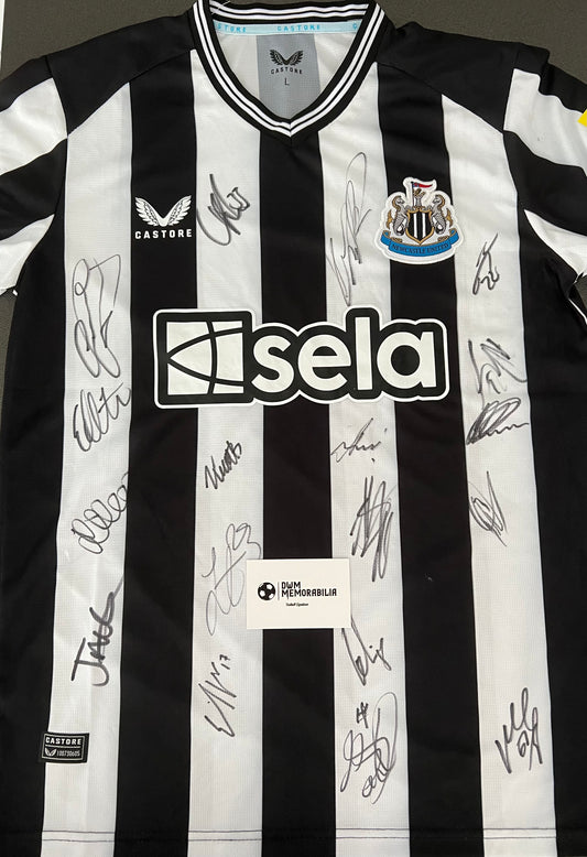 Newcastle United squad signed shirt.