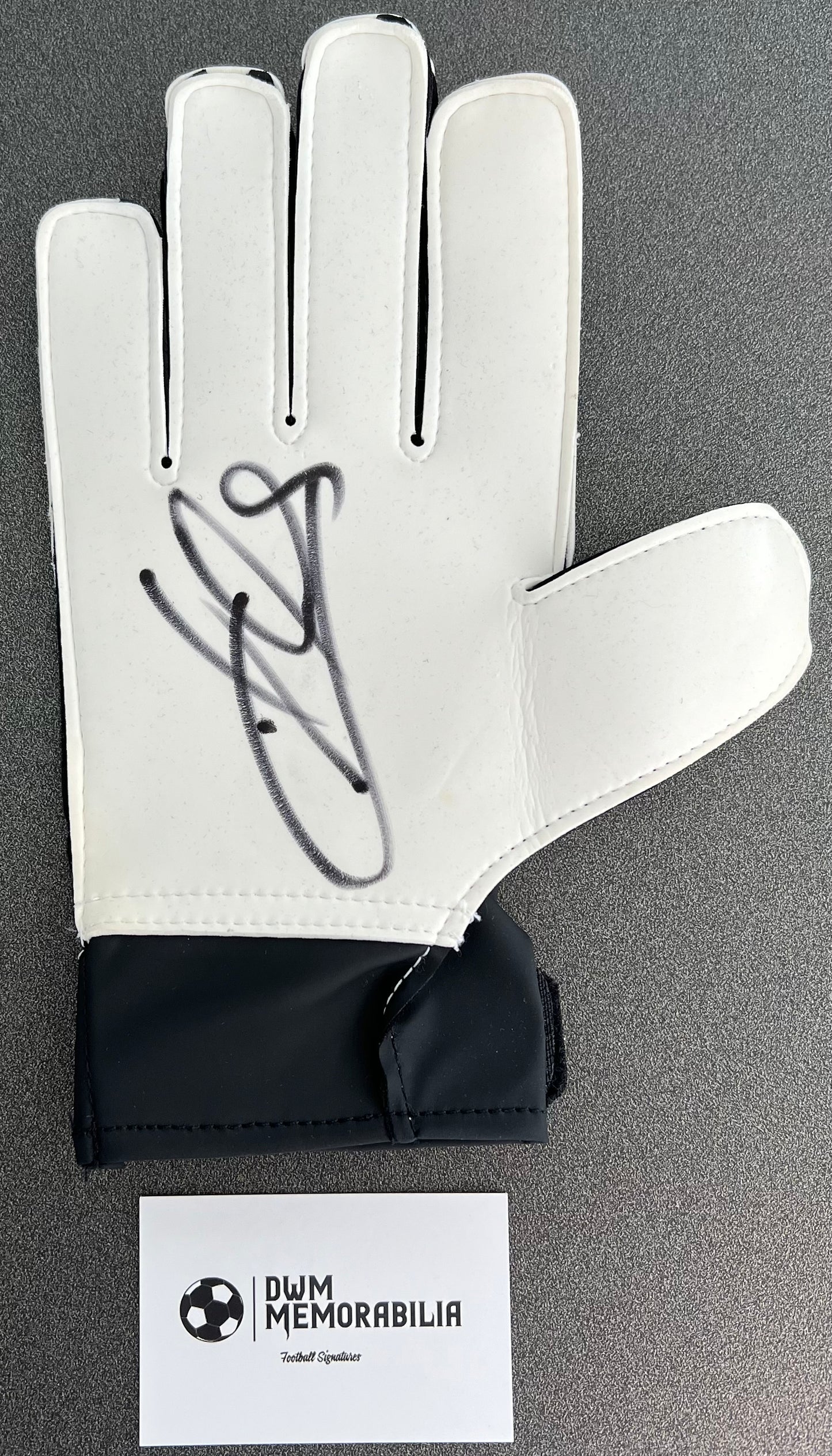 Iker Casillas signed goalkeeper glove.