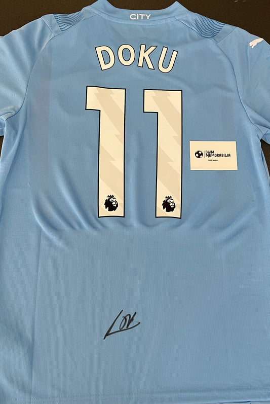 Jeremy Doku signed shirt.