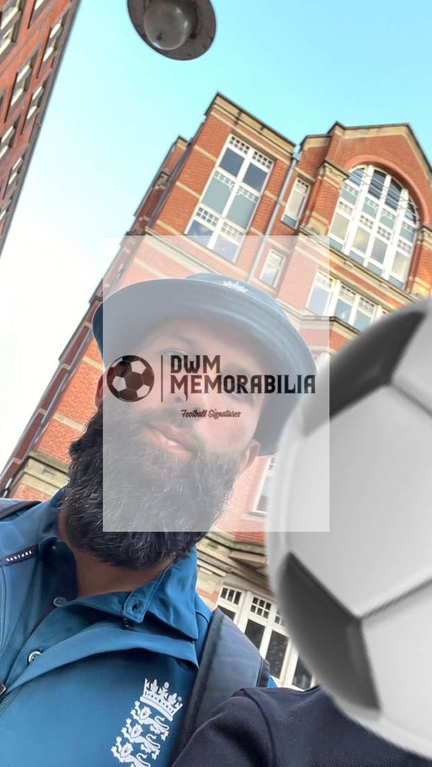 Moeen Ali signed cricket ball.